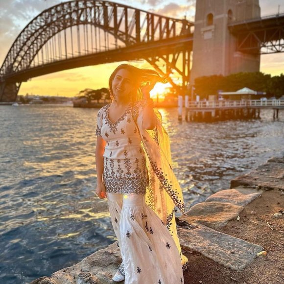 BEAUTIFUL SARA ALI KHAN WHITE SHRARA SET WITH ALL OVER SEQUENCE EMBROIDFERY WORK - Picture 8 of 12